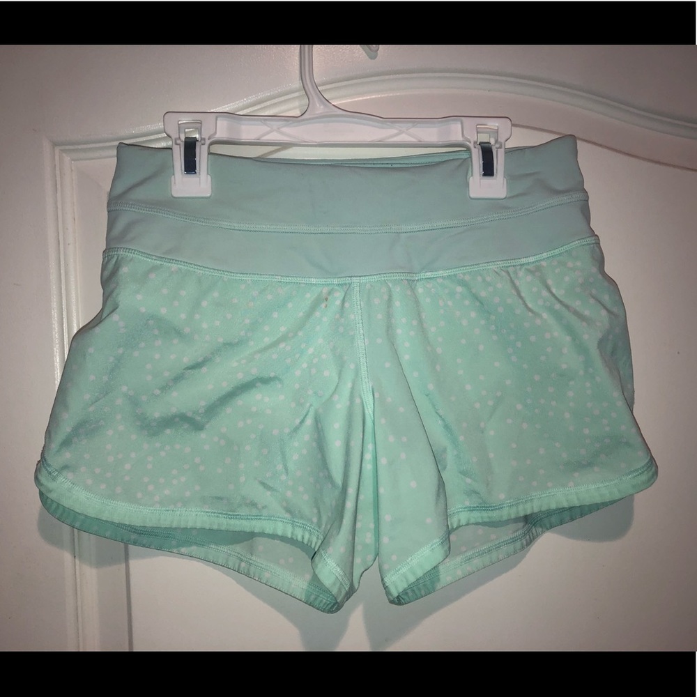 Light green Lululemon 4 inch shorts